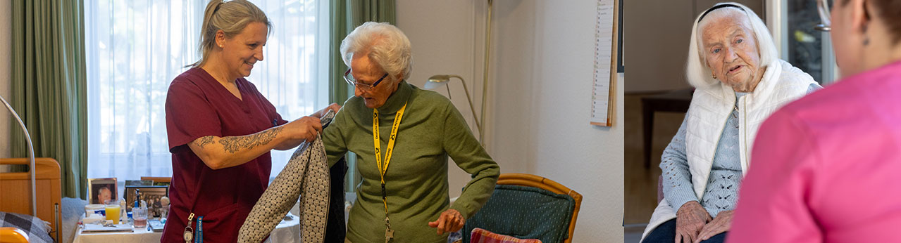 Eine Pflegekraft hilft einer Seniorin beim Anziehen in einer gemütlichen Umgebung | © Name
